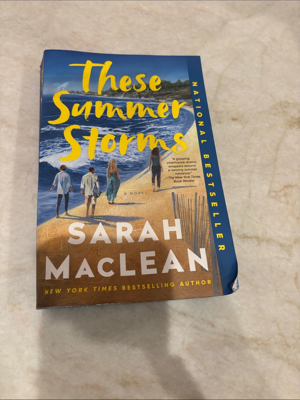 These Summer Storms by Sarah MacLean - Blue & Yellow Paperback Novel